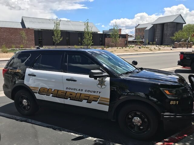Douglas County Sheriff vehicle outside of the Judicial and Law Enforcement Center in Minden